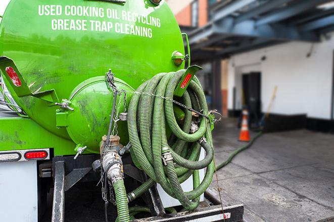 commercial kitchen grease trap receiving routine pumping in Canton